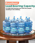 26.7 inch tempered glass lazy susan rotating serving tray displaying water bottles to showcase load-bearing capacity.