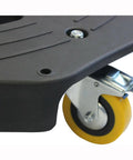 Close-up of black Heavy Duty Tire Dolly with yellow swivel caster, part of 300 lb Capacity Rolling Wheel Dolly for smooth motion and stable alignment.