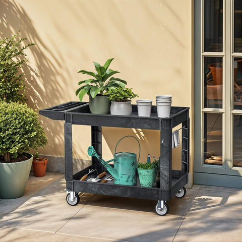 Heavy Duty 2 Shelf Plastic Utility Service Cart On Wheels With 550 Lb Capacity And 45 X 25 Inch Size Rugged Rolling Work Cart For Warehouse Garage School And Office Corrosion Resistant And Built Tough Black, holding plants and garden tools.