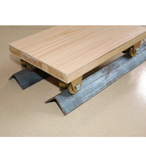 Wooden platform on Four Pack Color Zinc Plated V Groove Track Wheel Set showing installation on metal rail