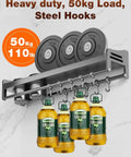 Heavy duty wall mounted kitchen rail with steel hooks, supporting 50kg load, illustrated with weights and oil bottles hanging.