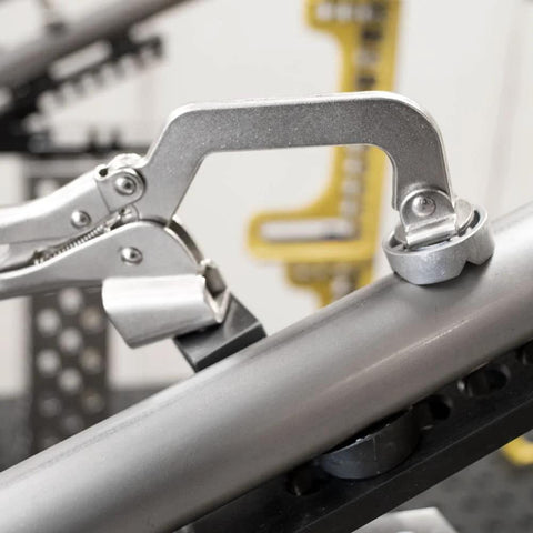 Heavy Duty Five Eighths Inch Insert Table Mounted Clamp With Rear Crank Handle For BuildPro Welding Tables in use