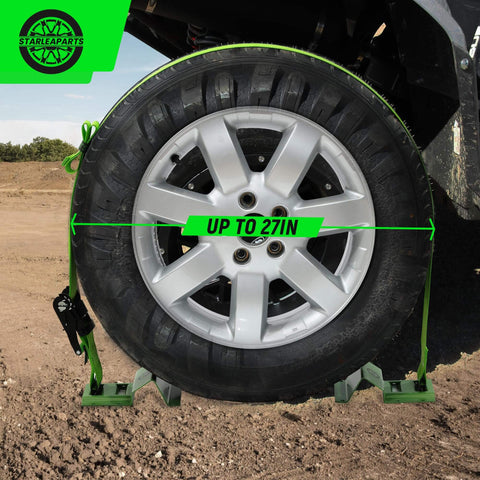 Heavy Duty Wheel Chock Tie Down Straps Set Two Pack With 4,400 Lb Max Break Strength And 2 Inch By 6 Foot Trailer Tire Straps Plus Four Wheel Chocks For ATVs UTVs Mowers And Tractors Safe E Track Compatible shown securing a wheel