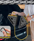 Man holding heavy duty wheel chocks with 39 inch rope for trailers RVs cars trucks and ATVs non slip grip on uneven ground