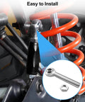 Right hand 3/4 inch Heim joint rod end with jam nut, installed in suspension system, focus on steel and zinc finish.
