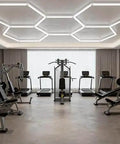 Hexagon LED Garage Light Fixture Dope Bright 6500K 156W 17280LM For Garage Ceiling Gym installed in modern workout space