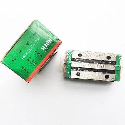HGH30HA HIWIN Linear Block for HGH30 Linear Motion Slider Rail Guide Linear Bearing, shown in packaging with exposed metal rails.