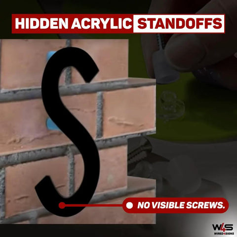 Acrylic Sign Mounting Hardware Hidden Clip In Sign Standoff Mounts on brick wall with no visible screws, close-up of installation.