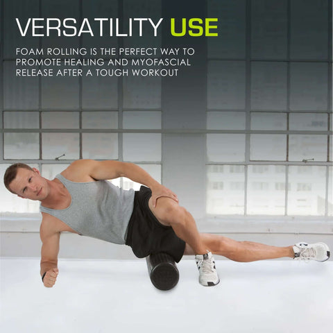 Man using High Density Foam Roller 12 Inch Long Firm Full Body Massage Tool for muscle recovery in gym setting.