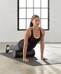 High Density Foam Roller For Exercise And Recovery 18 Inches Black With Durable Polypropylene Core in use during workout