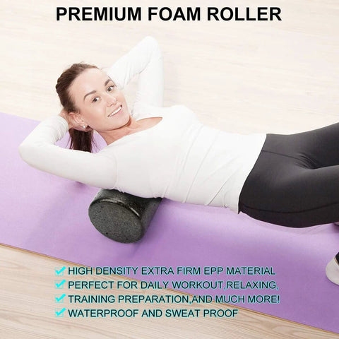 Woman using high-density 12-inch foam roller on yoga mat for full body recovery
