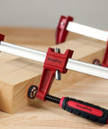 HimaPro 12 inch woodworking bar clamps set in use for secure wood clamping, ideal for precise DIY projects with strong hold features.