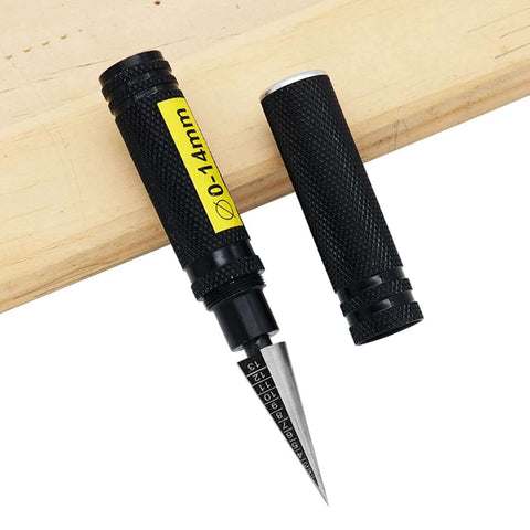 0 To 14mm Model Hole Puncher And Reamer Tool with protective sleeve on wooden board