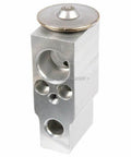 Close-up of a metal expansion valve from Air Conditioning Compressor And Repair Kit For Honda CRV 2007 2008 2009 2010 2011 Premium ISO TS16949 Quality Guaranteed Exact Fit Easy Install With 2 Year Unlimited Mileage Warranty And Durable OEM Grade Components.