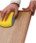 Using 5 Inch Hook And Loop Mouse Sanding Block on wood surface