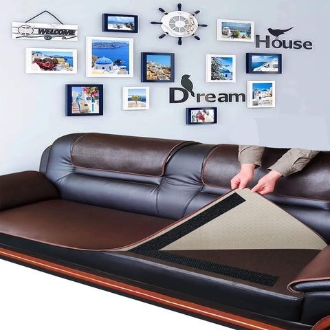 Person applying Two Inch Wide Hook And Loop Tape Set With Self Adhesive Backing in Black Nylon on couch cushions.