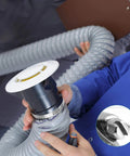 4 Pack 3 Inch Hose Clamps 304 Stainless Steel Worm Gear Adjustable Duct Clamps attached to a flexible vent hose.