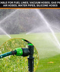 Sprinkler system on lawn with green hose and 380 Pcs 6 To 22 Mm Spring Hose Clamps Kit 12 Sizes Black Fuel Line Clamps.