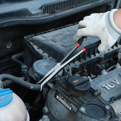 Using Three Piece Beefy Hose Gripper Pliers Set Spark Plug Pliers on automotive hose in engine bay, carbon steel with machined jaws.