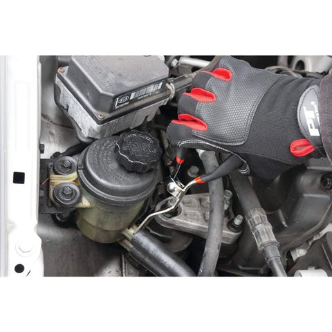 Using hose removal pliers for fuel, vacuum, and heater hoses, 5/32 to 1/2 inch capacity, heavy duty steel, in tight engine bay