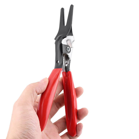 Hand holding Automotive Hose Removal Pliers for Fuel and Vacuum Lines, features red rubber grips, sturdy steel construction for hose disassembly