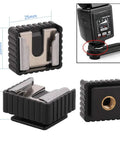 Close-up of flash shoe adapter from 26 Piece Camera Screws Mount Set One Quarter Inch And Three Eighth Inch Threaded Converter Adapters