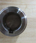 Top view of Two HSB Hub Assembly With 1.125 Inch Bore For One Quarter Inch By One Eighth Inch KW 1 SS Shafts Rexnord 7300235 Pipe And Coupling Machine Part For Beefy Heavy Duty Industrial Transmission on wood surface