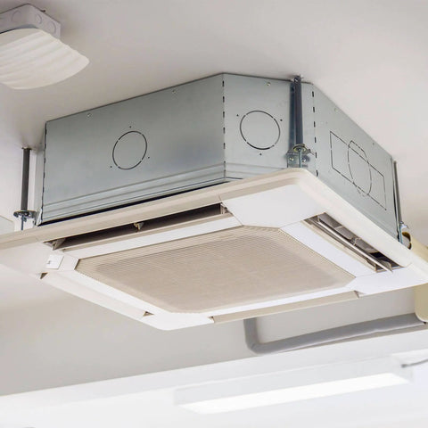 Ceiling-mounted air handling unit using two-pack vibration isolators for effective noise and vibration reduction up to 55 lbs each.