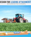 Tractor on a green field with Liftwell hydraulic cylinder, showing design for leading attachments.