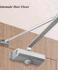 Heavy Duty Hydraulic Door Closer With Adjustable Arm And Hold Open Aluminum Alloy Construction Soft Close Action installed on wood door.