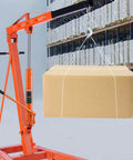 Heavy Duty 3 Ton Hydraulic Long Ram Jack For Engine Hoists And Garage Cranes With Clevis Base Slow Release Lift shown lifting a box