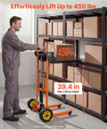 Heavy Duty Hydraulic Material Lift Stacker With 450 Lb Load Capacity And 39.4 Inch Lift Height, Foldable Portable Pallet Truck Dolly With Fork Lift Table For Home Garage Or Shop, Orange And Black in use by a person lifting a box