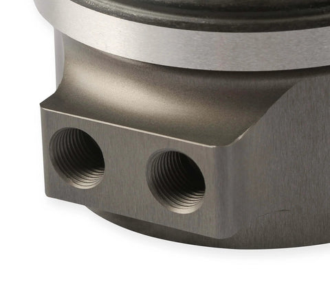 Close-up of Hydraulic Release Bearing Kit For Manual Transmissions With Adjustable Travel showing threaded ports.