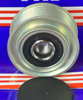 F-232774 Overrunning Alternator Pulley for Hyundai, close-up on metal grooves and central gear, blue and red packaging background