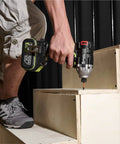 Using a drill with the 20 Piece Impact Hex Bit Set With Magnetic Tips Quarter Inch Shank S2 Steel CNC Machined Bits In Storage Box on stairs.