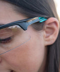 Side view of Impact Resistant Sport Glasses With UV Protection And Non Slip Frame on a person outdoors