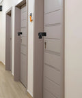Hallway with doors secured by 4 Inch 90 Degree Stainless Steel Padlock Hasps With Padlock And Keys Set, right angle door latch for security.