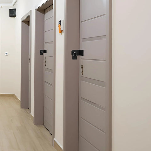 Hallway with doors secured by 4 Inch 90 Degree Stainless Steel Padlock Hasps With Padlock And Keys Set, right angle door latch for security.