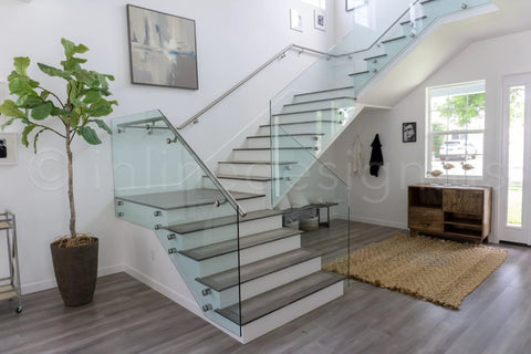 Stainless Steel Glass Clamp Standoffs Round Large Heavy Duty 2 Inch Inline Design on indoor glass staircase with modern decor