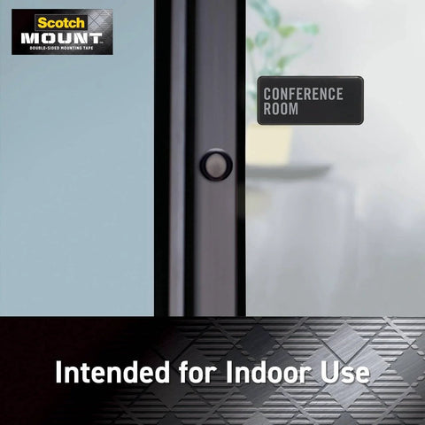 Clear Double Sided Mounting Tape With Ultra Strong 3M Industrial Adhesive showcasing invisible bond on glass indoors.