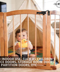 Sliding Door Latch With Hook Black Cam Latch used on a wooden pet partition door for safety in home interior