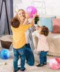 2PCS Inflatable Playground Balls, 8.7 Inch Marbleized Bouncy Balls in play indoors with children.