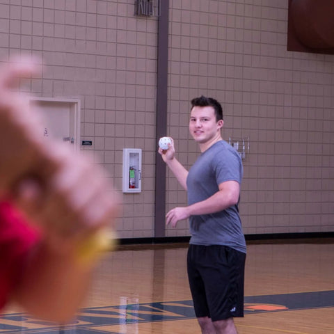 Person playing indoors with 9" Hollow Plastic Baseballs - Athletic Baseball Equipment - Practice Baseballs Plastic Hollow - Regulation Size Balls.
