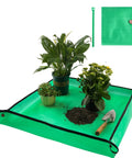 Indoor Plant Repotting Mat For Transplanting And Mess Control, Waterproof 26.8 inch square tray with potted plants and garden tools.