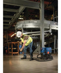 Worker using One And One Eighth Inch SDS-Plus Bulldog Xtreme Max Rotary Hammer For Concrete Drilling And Chiseling In Masonry