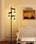 Industrial Dimmable Floor Lamp With 3 Heads 68 Inch Tall Tree Floor Lamp in Black Metal and Wood next to a sofa in a living room.