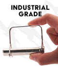 Hand holding a single pin from Beefy 5/8 Inch Square Trailer Pin Set, 3 Inch Long, Six Pack Of Lock Pins For Trailer Hitches.