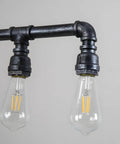 Close-up of Rustic Industrial Tube Pipe Chandelier With Five Light Edison Style Steampunk Pendant Light Fixture details