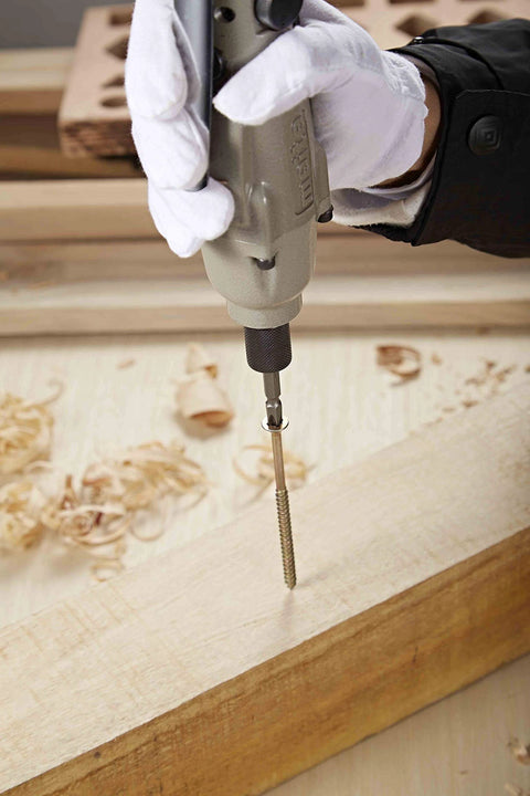 Using the 1/4-Inch Industrial Air Torgue Pneumatic Screwdriver with 9500 RPM Speed on a wooden surface