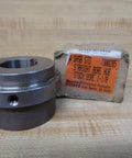 Industrial Shaft Coupling Rexnord 7300285 Straight Bore Hub With 1-1/8 In Bore on wooden surface
